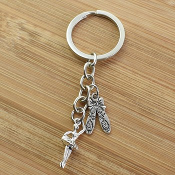 Zilveren ster danseres en dansschoen sleutelhanger