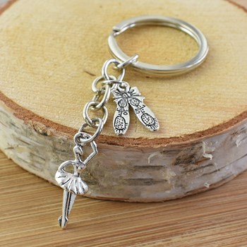 Zilveren ster danseres en dansschoen sleutelhanger