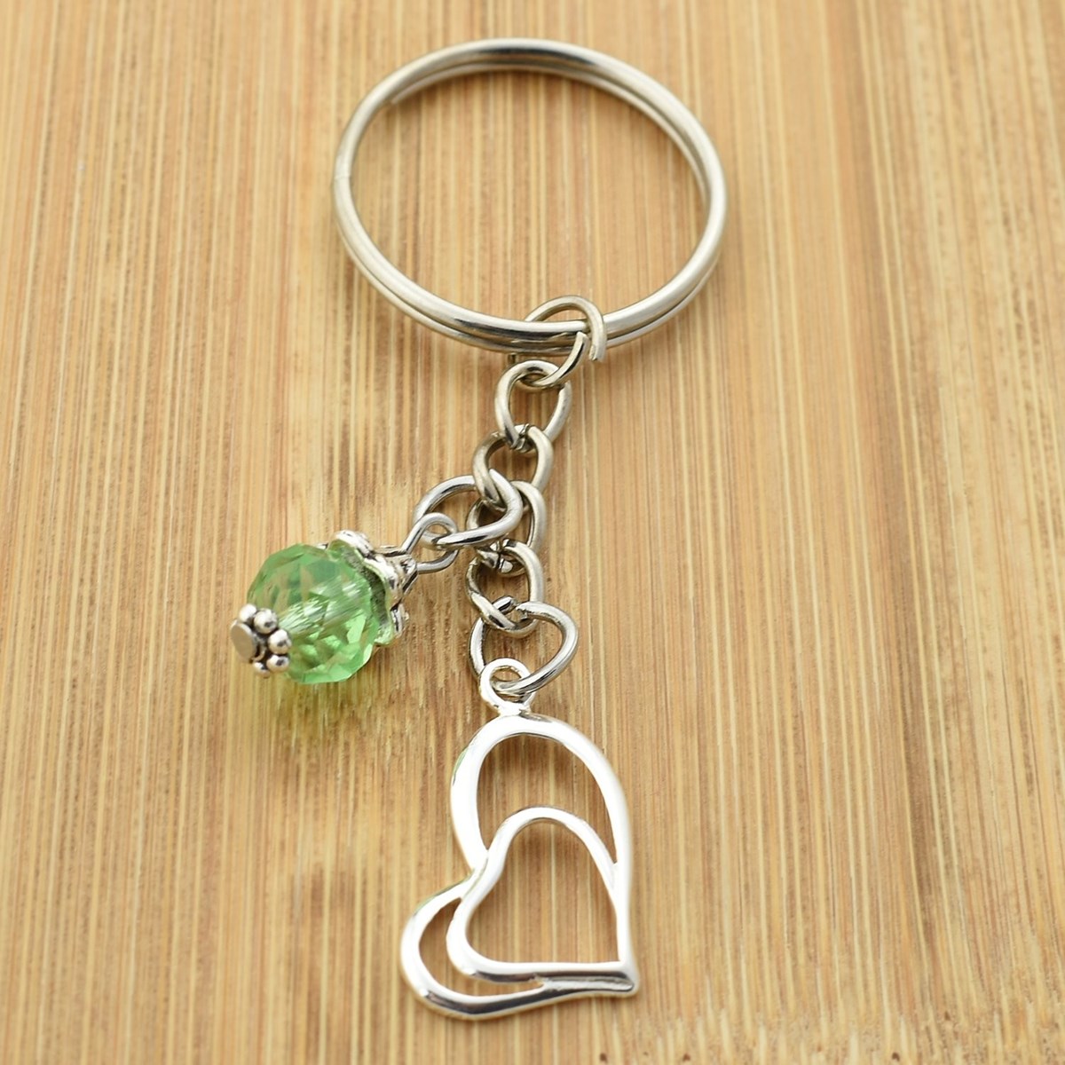 Porte-clés coeur argenté et perle à facettes verte - vue 2