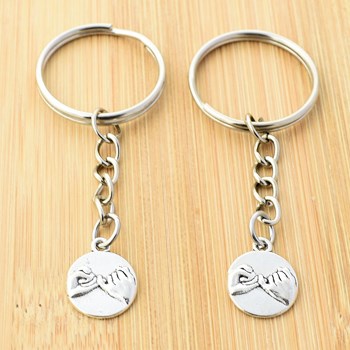 Zilveren pink belofte sleutelhanger, set van 2