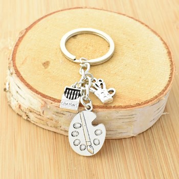 Zilveren kunstenaar sleutelhanger