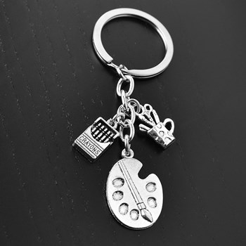 Zilveren kunstenaar sleutelhanger