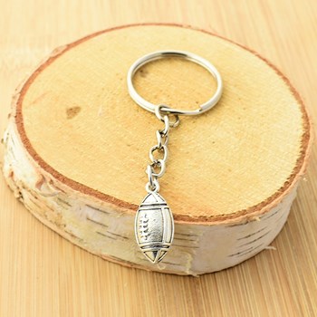 Porte-clés ballon de rugby argenté