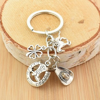 Porte-clés cowboy cheval chapeau trèfle argenté