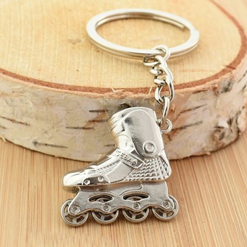 Porte-clés roller patin à roulettes argenté