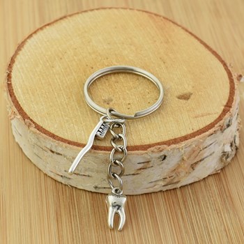 Porte-clés dent et brosse à dents thème dentiste assistant dentaire argenté