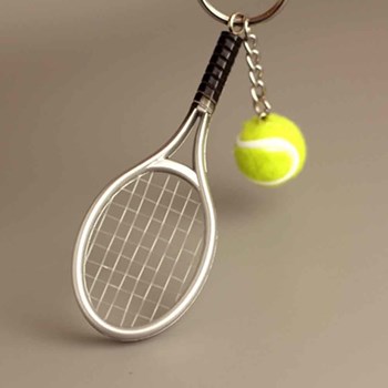 Porte-clés raquette fil de nylon et balle de tennis verte argenté