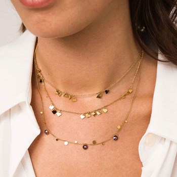 Ketting van verguld staal met oranje kristallen