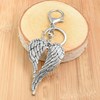 Porte-clés bijou de sac ailes d'ange argenté - vue V3