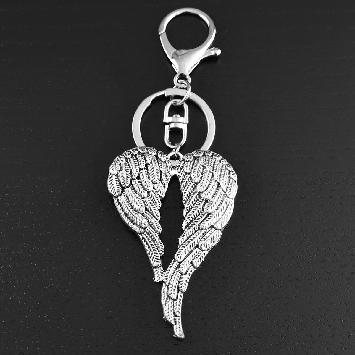 Porte-clés bijou de sac ailes d'ange argenté - vue 4