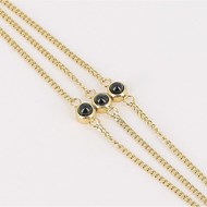 Bracelet  Zag Bijoux acier doré noir onyx