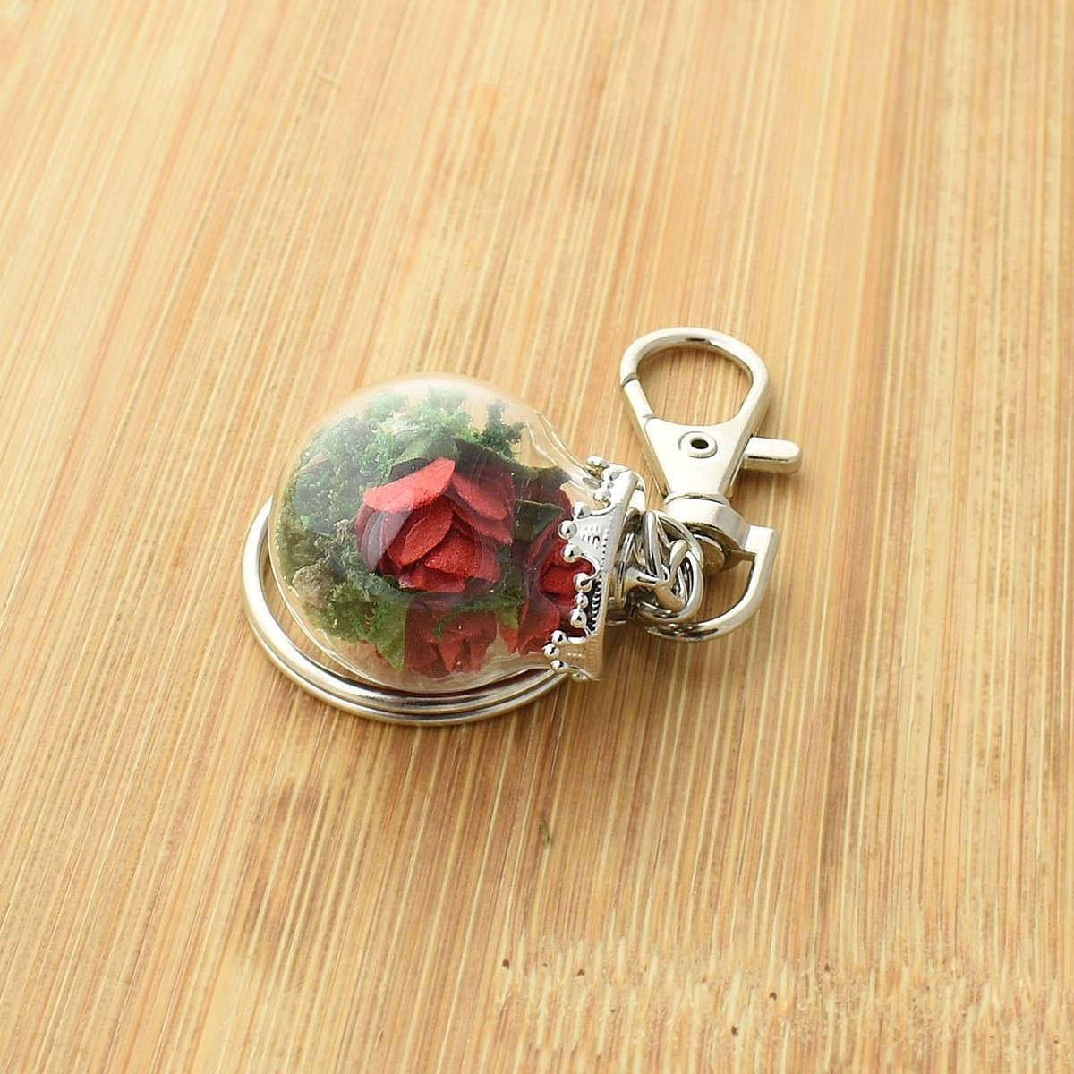 Porte-clés bijou de sac petit flacon de roses rouges - vue 2
