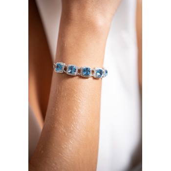 Zachte armband MARGARET in zilver met synthetische topaas blauwe steen