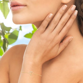 Bracelet coeur d'infini serti d'oxydes de zirconium Plaqué OR 750 3 microns