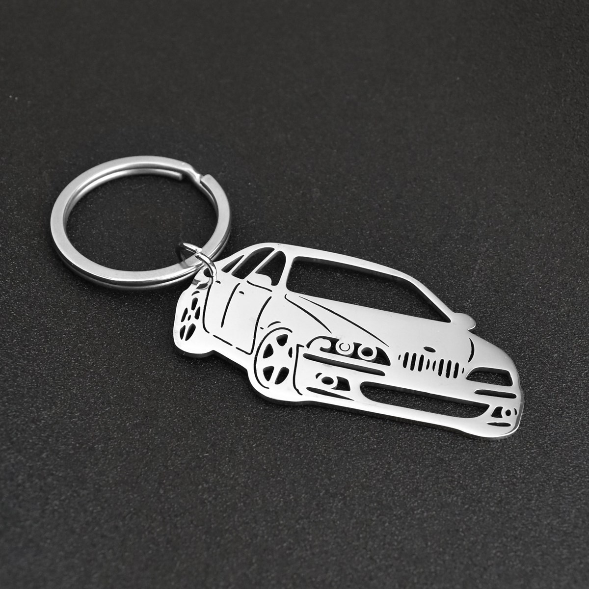 Porte-clés forme de voiture automobile ajourée argentée - vue 4