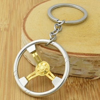 Silver and gold car steering wheel key ring