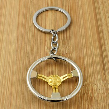 Silver and gold car steering wheel key ring