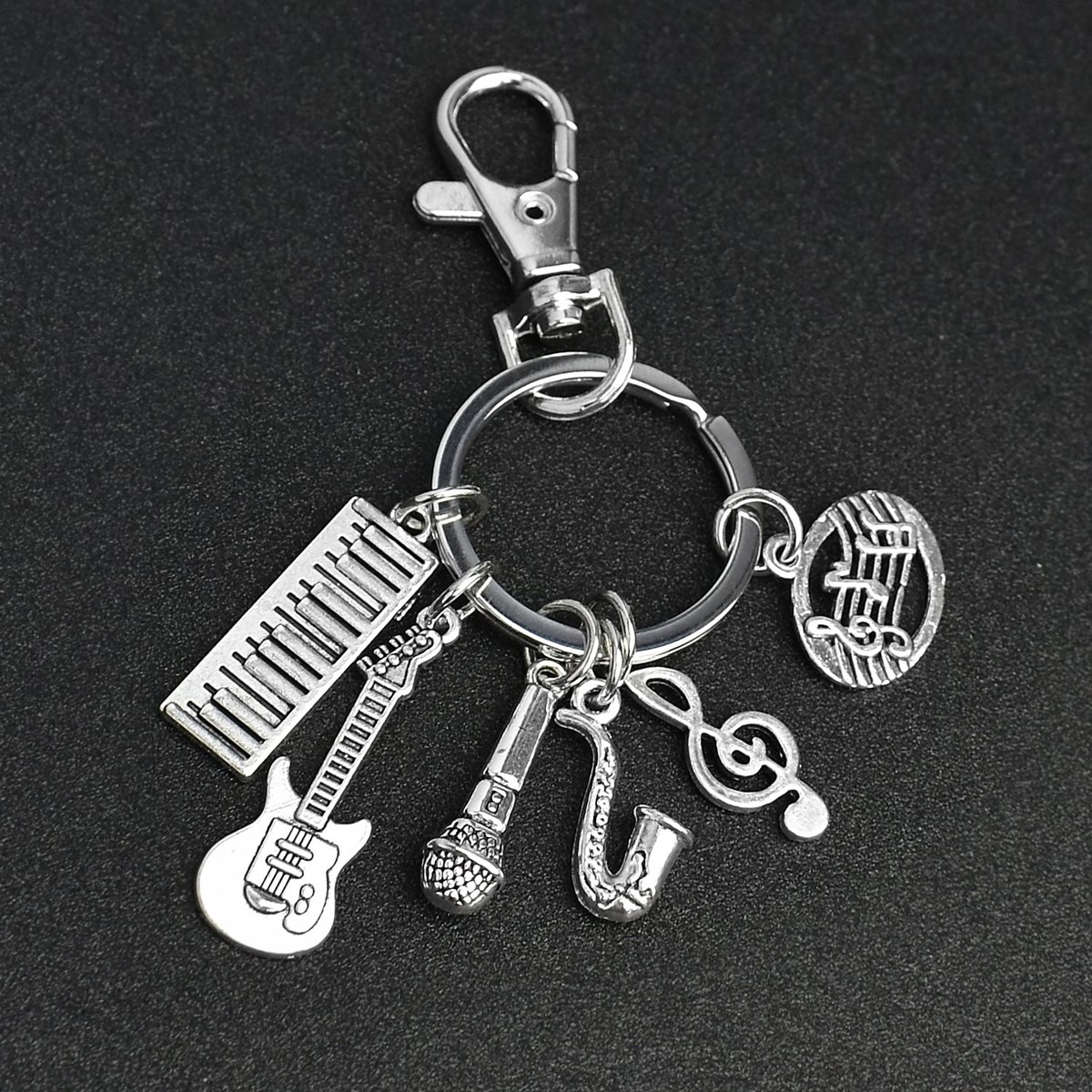 Porte-clés thème musique artiste notes guitare piano micro bijou de sac avec mousqueton et anneau argenté - vue 4