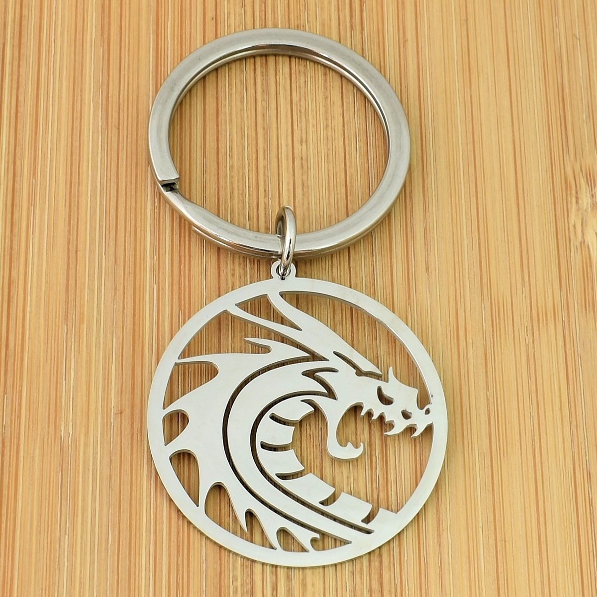 Porte-clés dragon dans un cercle acier inoxydable - vue 2