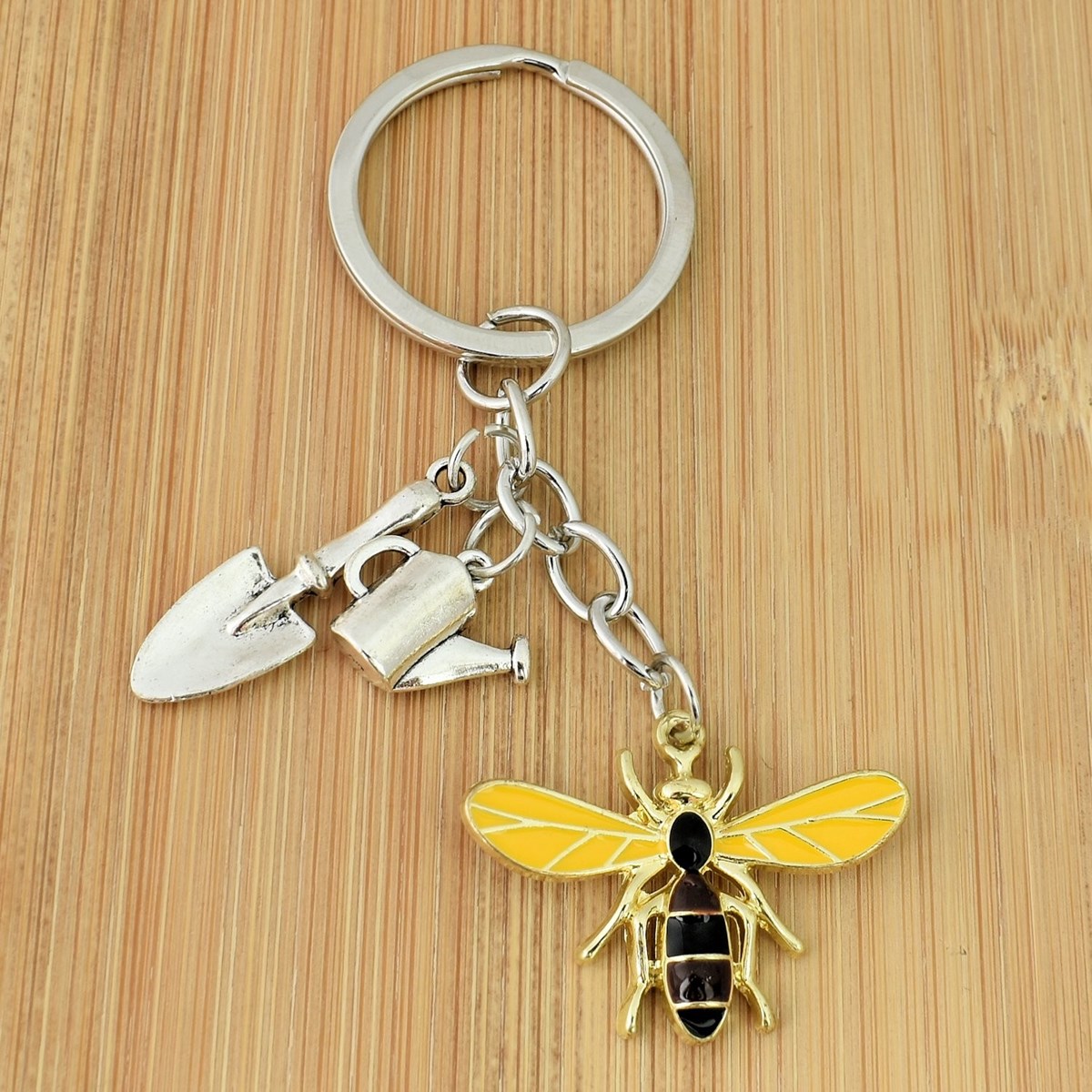 Porte-clés jardinier abeille pelle arrosoir argenté - vue 2