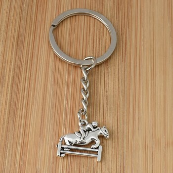 Silver horse and rider jumping key ring