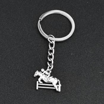 Silver horse and rider jumping key ring
