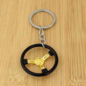 Black car steering wheel key ring Gold color