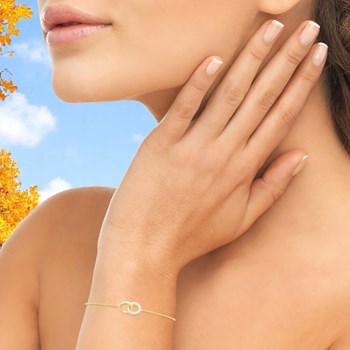 Bracelet 2 anneaux enlacés oxydes de zirconiums Plaqué OR 750 3 microns