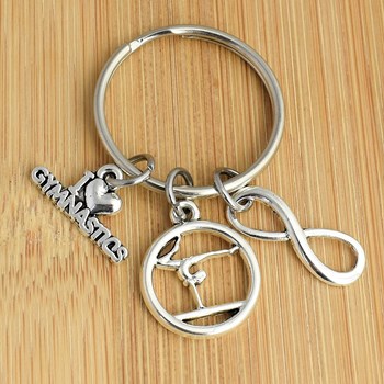 Silver infinity love gymnastics figure key ring for women