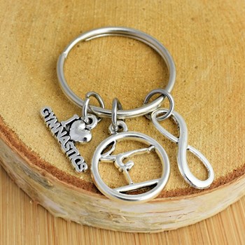 Silver infinity love gymnastics figure key ring for women