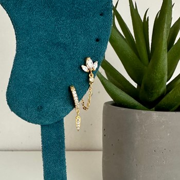 Brilliant clicker piercing ring with integrated charms