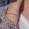 Collier, bracelet et boucles d'oreilles Serena en pierres Howlite - vue V4