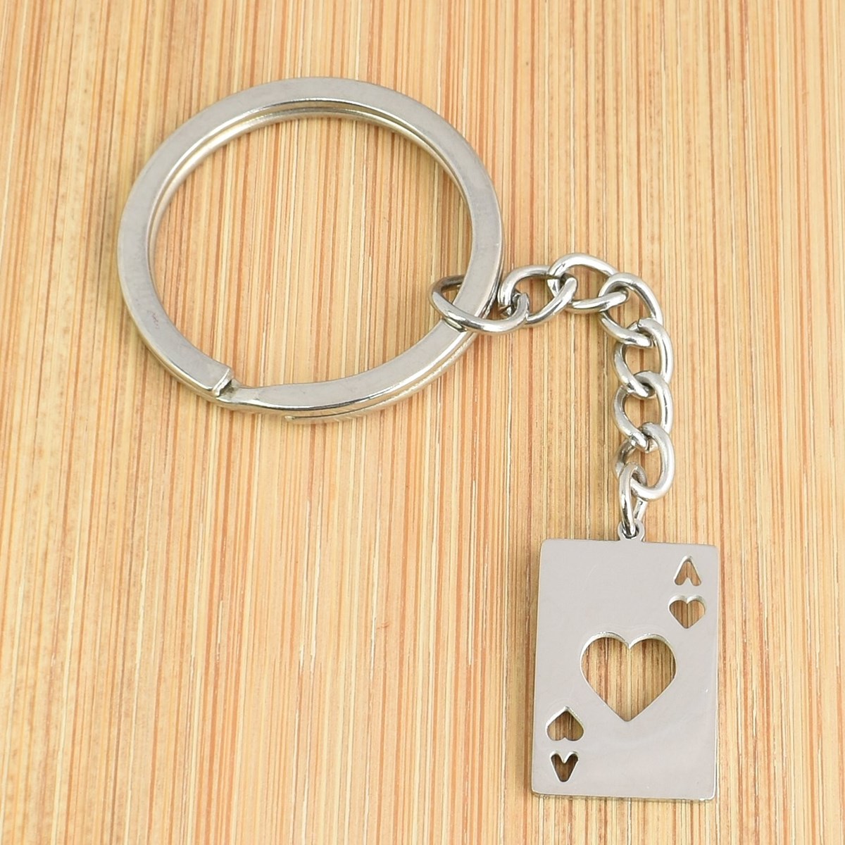 Porte-clés carte as de coeur ajouré en acier - vue 2