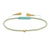 Bracelet Lien Tréssé Rond Bicolore Lurex Doré et Une Perle Or 14 Carats - Vert d'Eau - vue V1