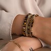 Bracelet Sparkling Jewels Saturne Small
Oeil de Tigre argent plaqué or - vue V2