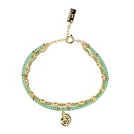 Bracelet multirang Les Cadettes perles vertes et
pampille coquillage